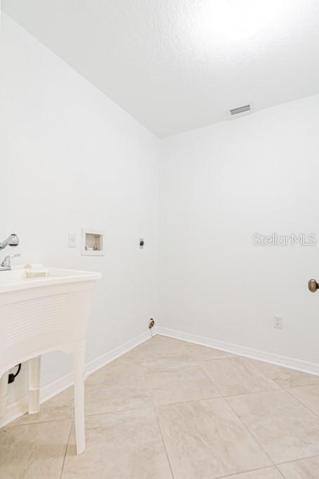 Laundry Room with Utility Sink
