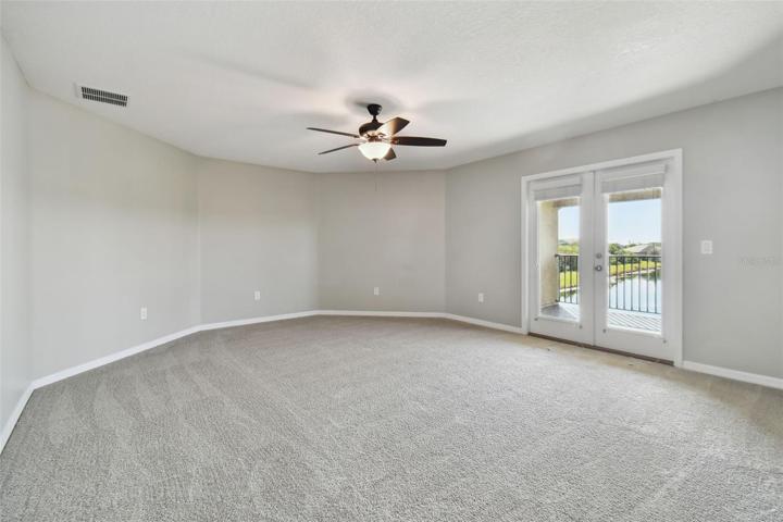 Large playroom/entertainment room with outside balcony.