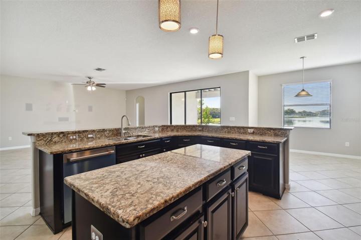 View from the kitchen towards the breakfast nook to your right and living room to your left.