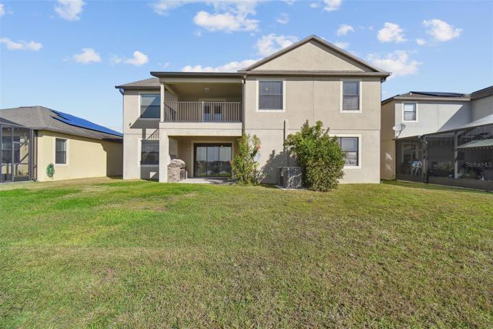 Rear of the home with plenty of space for all.