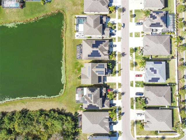 Direct aerial view above the home and neighbors.