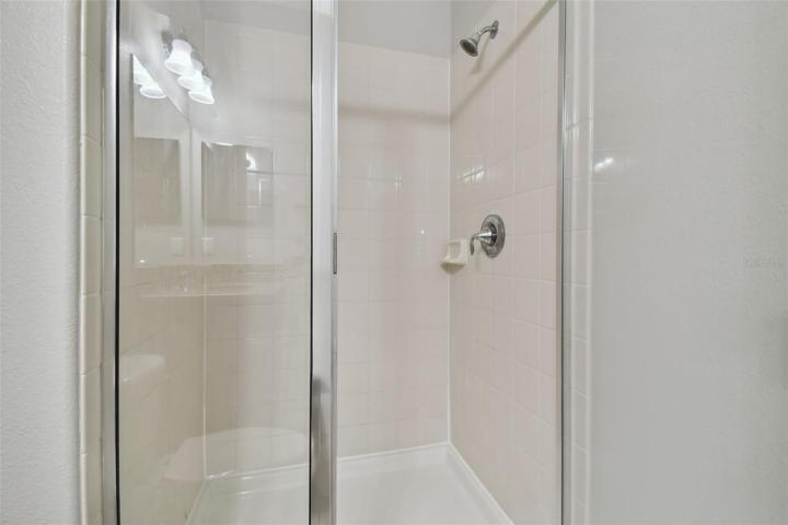 Walk-in shower in bathroom 1