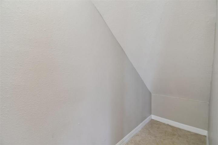 Understairs storage.