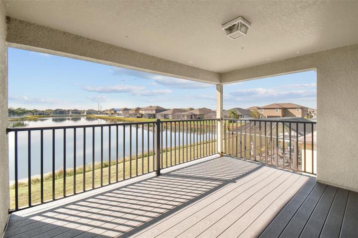 Balcony views of the pond.  Can be accessed from the Owners retreat or entertainment room.