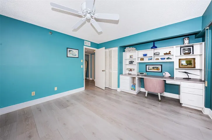 .. Main Floor : Guest Bedroom #Two - Office / Yoga Room .. Looking in From Balcony Towards Office Set Up.