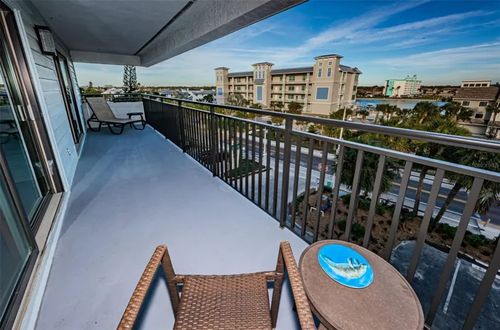 .. View From 27 x 5.5 Rear Balcony.  Since the Beach House is Only 12 Units - the Penthouse is Only 3 Floors Up.  With a 12 Foot Garage  Plus 3 Floors of Living- This is a Perfect Height For Privacy ..Water Views Across the Street.