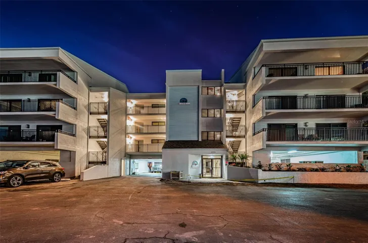 .. Night Shot - Complex Front. PH #  340  TOP RIGHT.