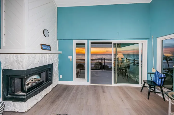 .. Corner Unit Has Side Windows Providing an Abundance of Natural Light into Residence #340.. Fireplace on Left.. NOTE: Owners have Fireplace insert and have not used original Fireplace for many years - just the insert..