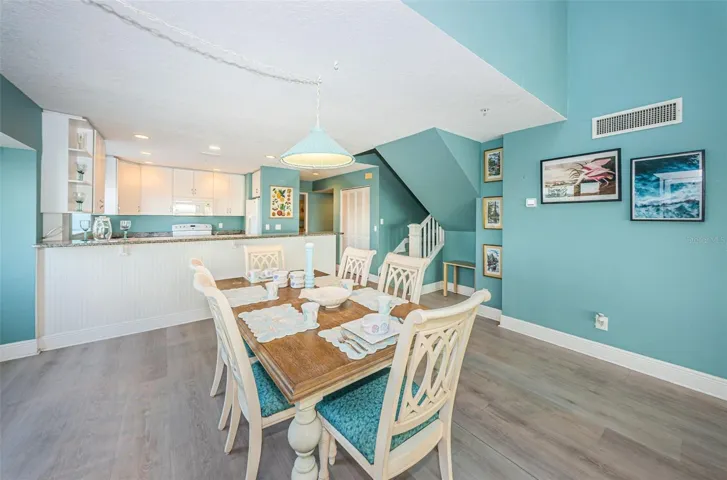 ... Perfect Shot of Dining Area and Kitchen.. This Penthouse is a Full Sized Home.. Main Floor alone is 3 Bedroom 2 Bath with mol 1675 Sq Ft Plus Two 27 Foot Long Balcony's...