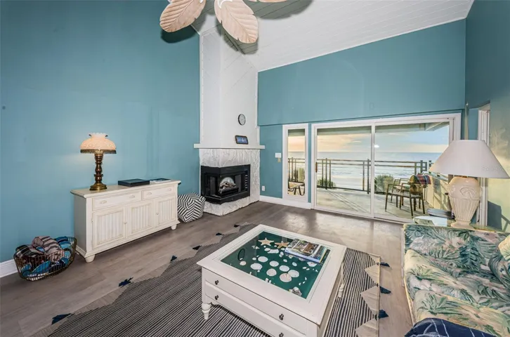 ... Main Floor 22' x 15' Living Room  - 18 Foot Vaulted Ceilings ..  Access to 27 x 10 Balcony..