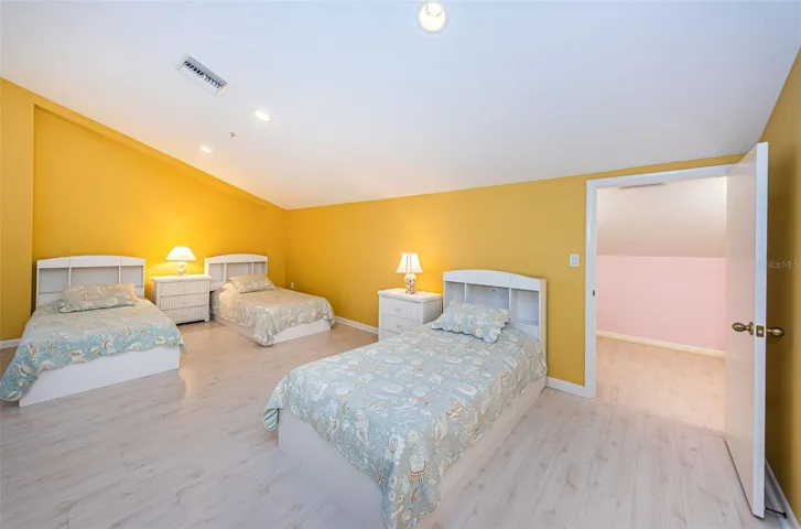 .. Right now they have Three Beds Here pus a Trundle on the other Side of Stairs,. Doorway Leads to 7' x 26'  Room for Storage.