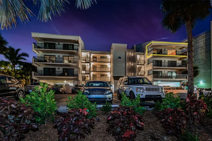 .. Night Shot of the Beach House.. Residence # 340 - Top Floor Right Side..