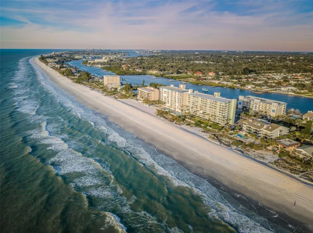 ... Aerial of Indian Shores Fl.. Beach House Bottom Right in Photo by Blue Pool. 7 am Shot -