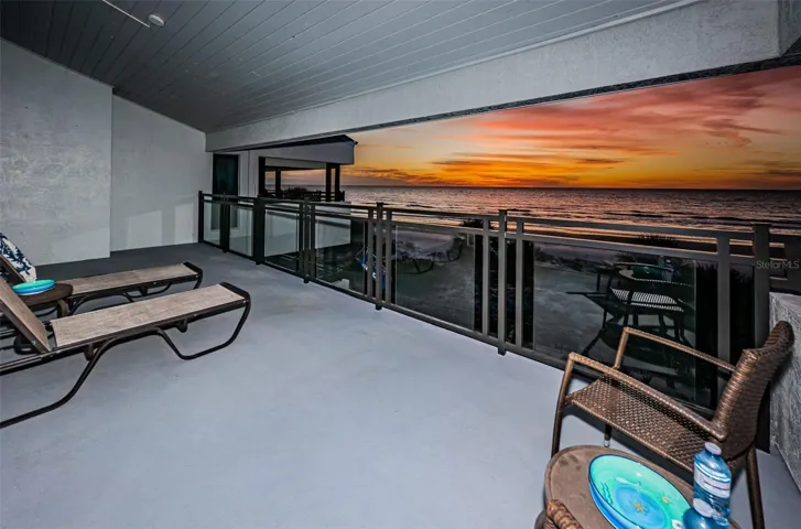 ... Sweeping Views of the Sunset.. New Glass Balustrade Railings are Fantastic for capturing the open water Views while sitting on the Balcony or in the Living Room.