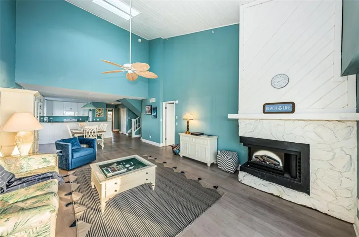 ... 22 x 15 Living Room Showcasing 18 Feet Vaulted Ceilings  with Skylight..