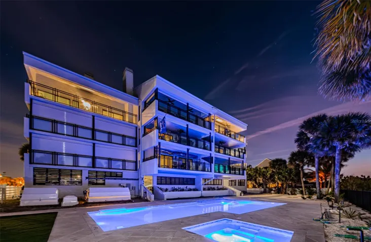 ...Night Shot -  Brand New Pool - Spa - Outdoor Kitchen and Lounging Areas.. PH # 340 Top Left.
