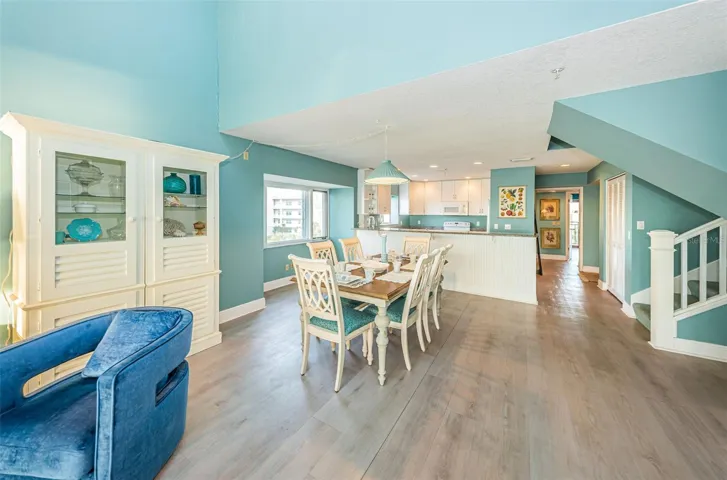 .. Main Floor: Looking In from Living Room  Towards Dining Area  - Kitchen and Rear Guest Quarters.    Stairs to 2nd Level on Right Across From Dining Area..