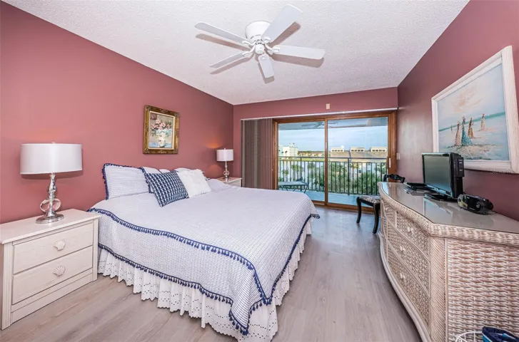 .. Main Floor: Guest Bedroom #1... Looking Out Towards 27 Foot Balcony .. Top Floor Affords Privacy off Balcony Which Looks due East... You can Watch the Sun Rise From Here and Watch the Sunset off the Living Room Balcony.