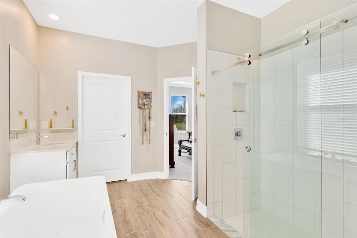 Owners Bath with large soaker tub and walkin shower