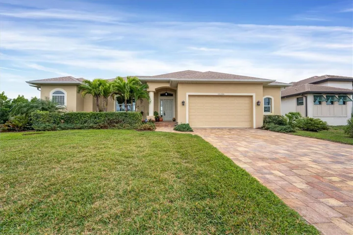 Front View with a complete  paver driveway & entrance.