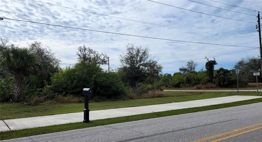 Wide multi-use pathway in front of the property.