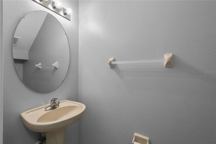 Half bath in hall right outside of your primary bedroom and living room