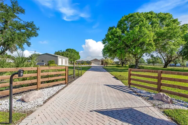 4/3/2 +Office. Attached Apt. Detached 8 car garage
