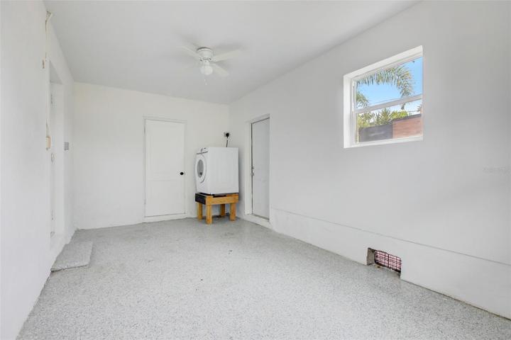 Kitchen and door to bonus room and laundry room.