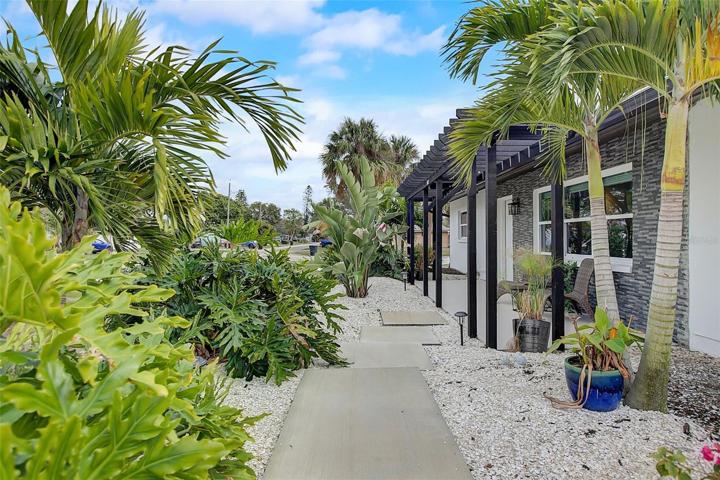Walkup to front door, side gate access to backyard.