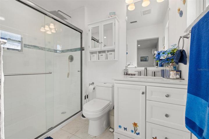 Master Bathroom with a large walk-in shower