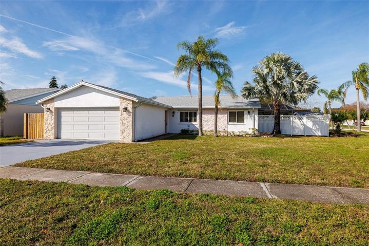 House is on a corner lot giving you lots of yard space