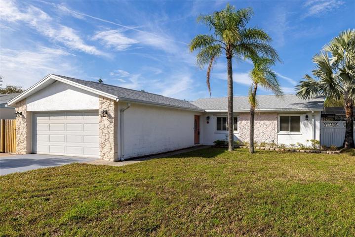 3/2 home with two car garage on corner lot