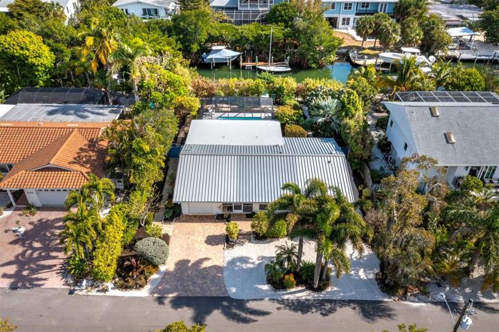 Welcome to 548 Lyons Lane. Situated on a beautiful lot with a canal out back and a protected wetland in the front