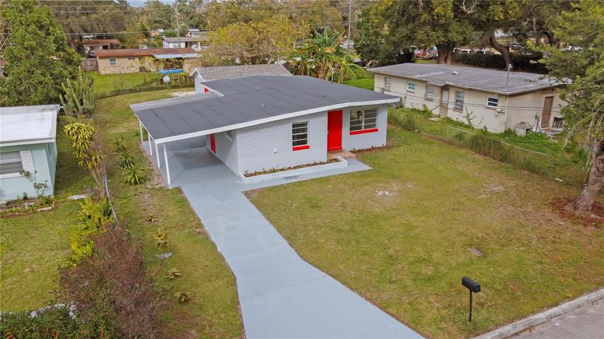 Immaculate, TOTALLY-RENNOVATED FOUR-Bedroom, TWO-BATH Concrete-Block Home with a ONE-CAR CARPORT and a Large Yard!