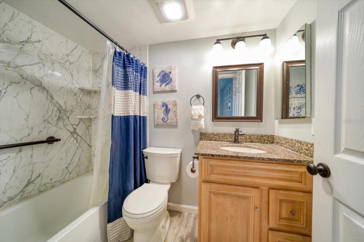 2nd bathroom with luxury vinyl flooring