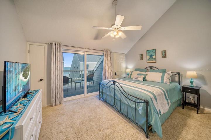 Vaulted ceilings in the primary bedroom gives a very spacious feel