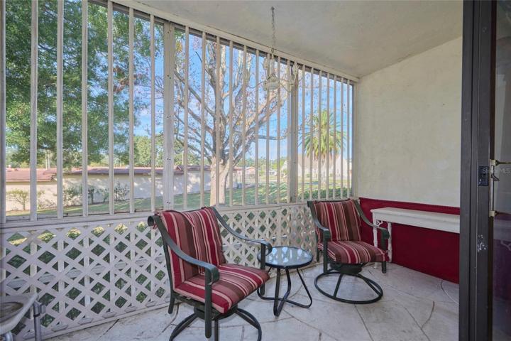 Lanai overlooks the greenspace/lawn
