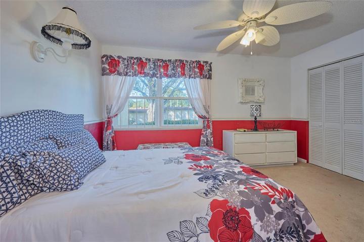 Guest bedroom offers views of greenspace