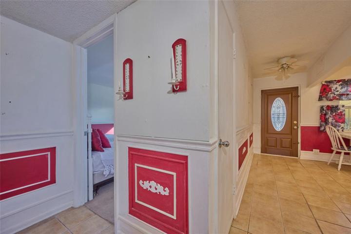 Master bedroom is at one end of the hallway