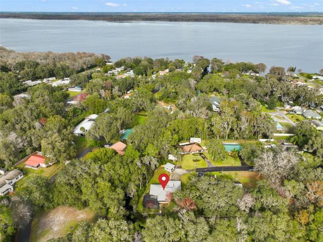 Just minutes off I-75 you will find this unique property tucked away at the end of a quiet street with CANAL frontage for ACCESS TO LAKE PANASOFFKEE!