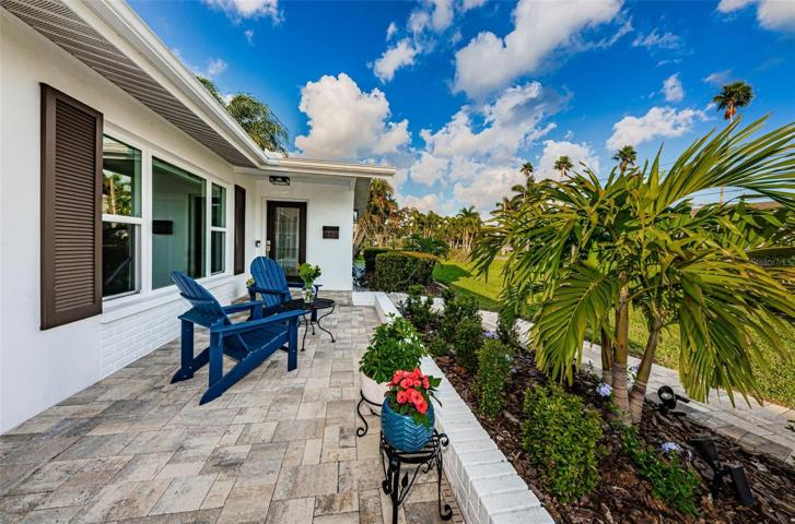 The front patio provides nice space to visit with neighbors after your evening walk.