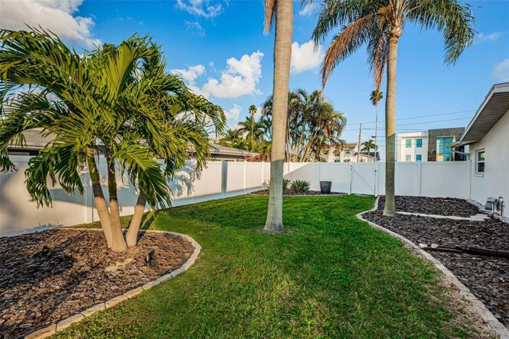 Even more grassy space on the north side of the home for pets and play.