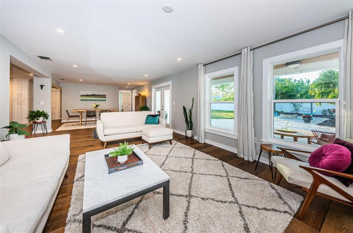 The rear living room was also custom designed to become a 4th bedroom.