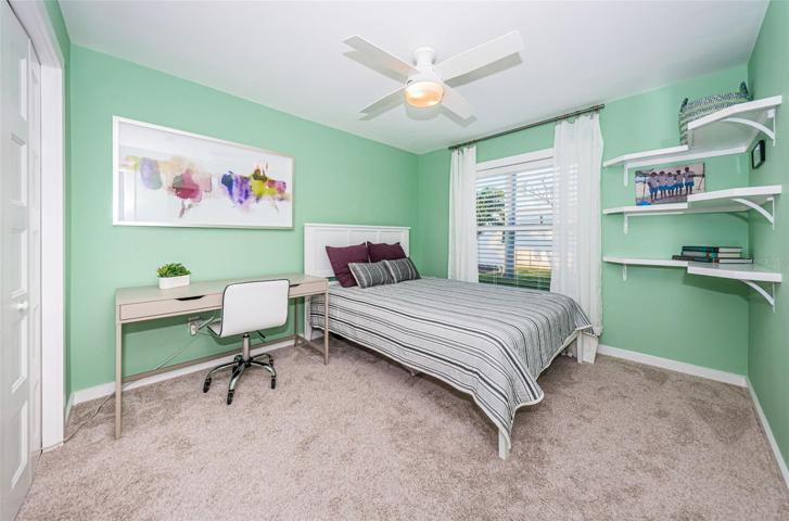Bedroom 3 is light and bright.