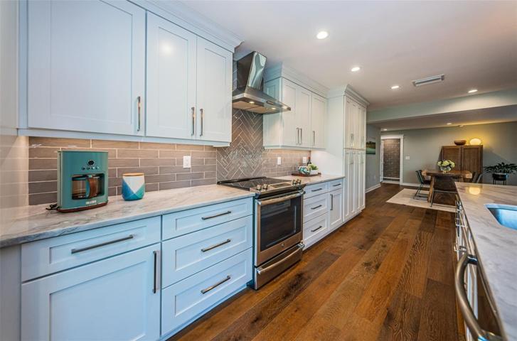 When the home was renovated, a completely new kitchen was installed with custom cabinetry.