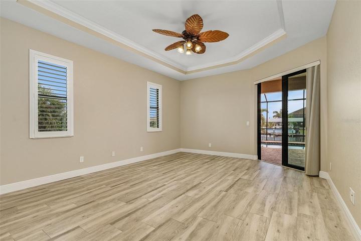 Master Bedroom w/Access to Lanai and Pool