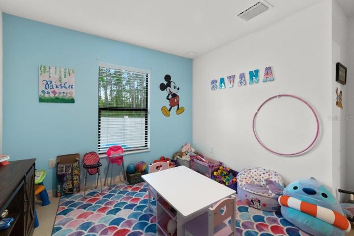 Guest bedroom #4 that can be used as an office or a home gym!