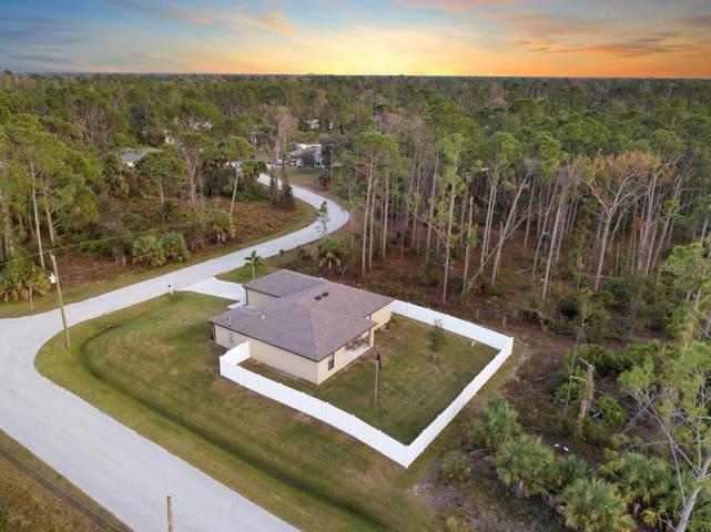 Aerial view showing the large lot and the back yard.