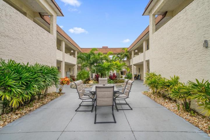 Shared living space well maintained by condo- outdoor seating!