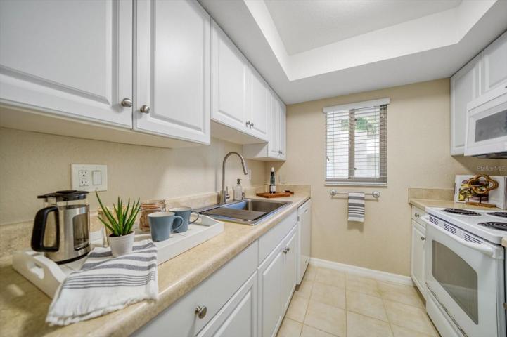 Kitchen with plenty of counter space to prepare meals or your happy hour drink!
